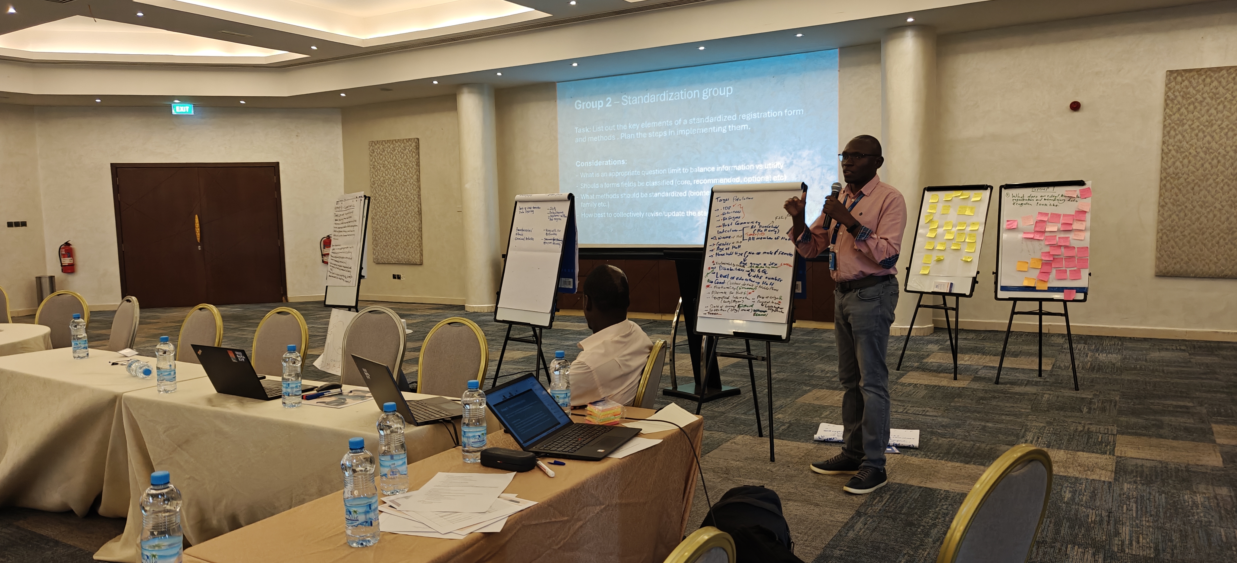 Benson from IOM presenting on the standardization of methods and data fields